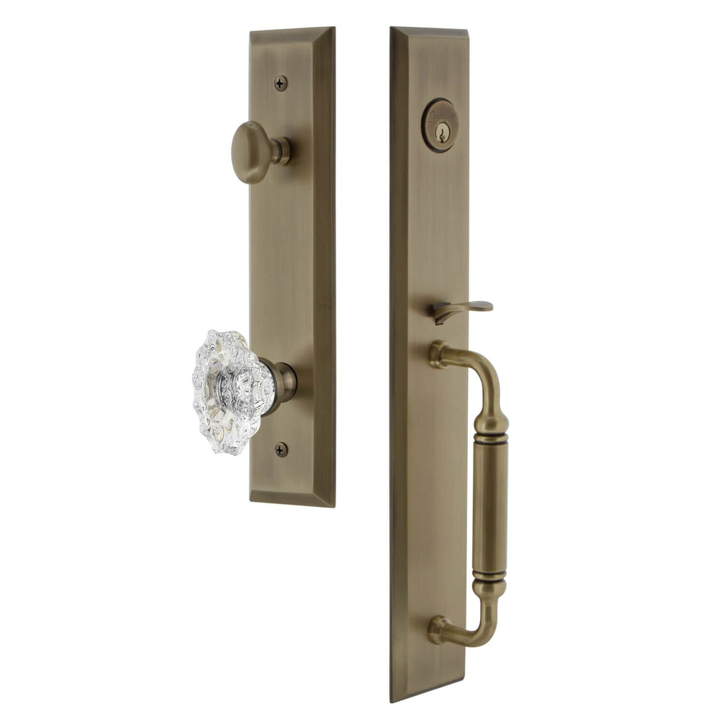 Fifth Avenue One-Piece Handleset with C Grip and Biarritz Knob in Vintage Brass