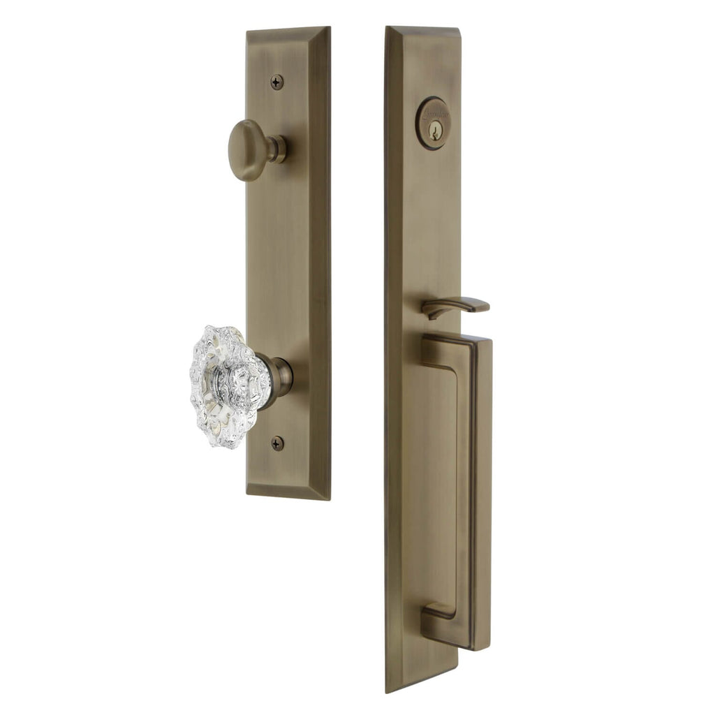 Fifth Avenue One-Piece Handleset with D Grip and Biarritz Knob in Vintage Brass