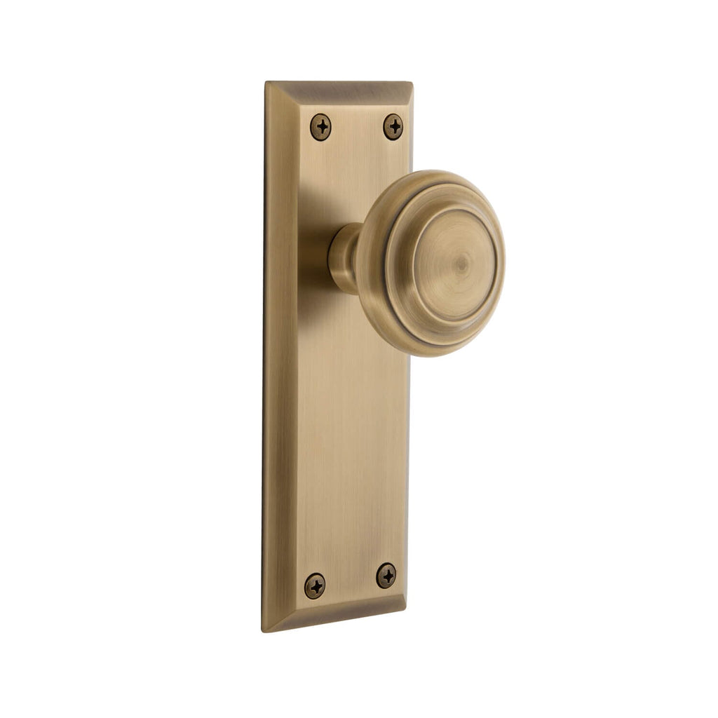Fifth Avenue Long Plate with Circulaire Knob in Vintage Brass