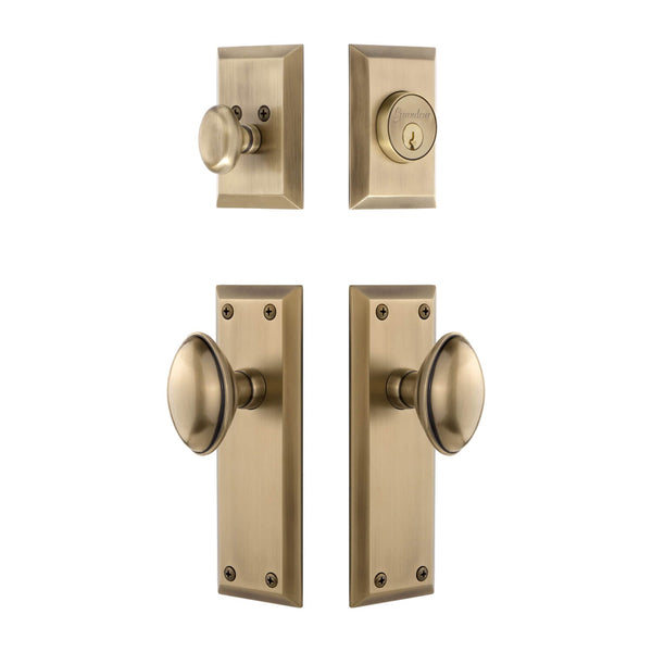 Fifth Avenue Long Plate Entry Set with Eden Prairie Knob in Vintage Brass