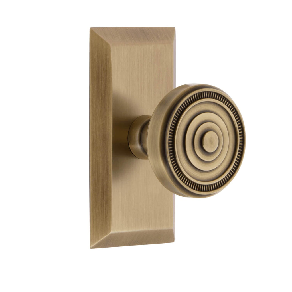 Fifth Avenue Short Plate with Soleil Knob in Vintage Brass