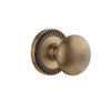 Newport Rosette with Fifth Avenue Knob in Vintage Brass